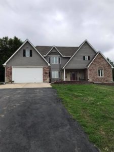 Oak Grove Missouri Shingle and Stone Appearance Siding